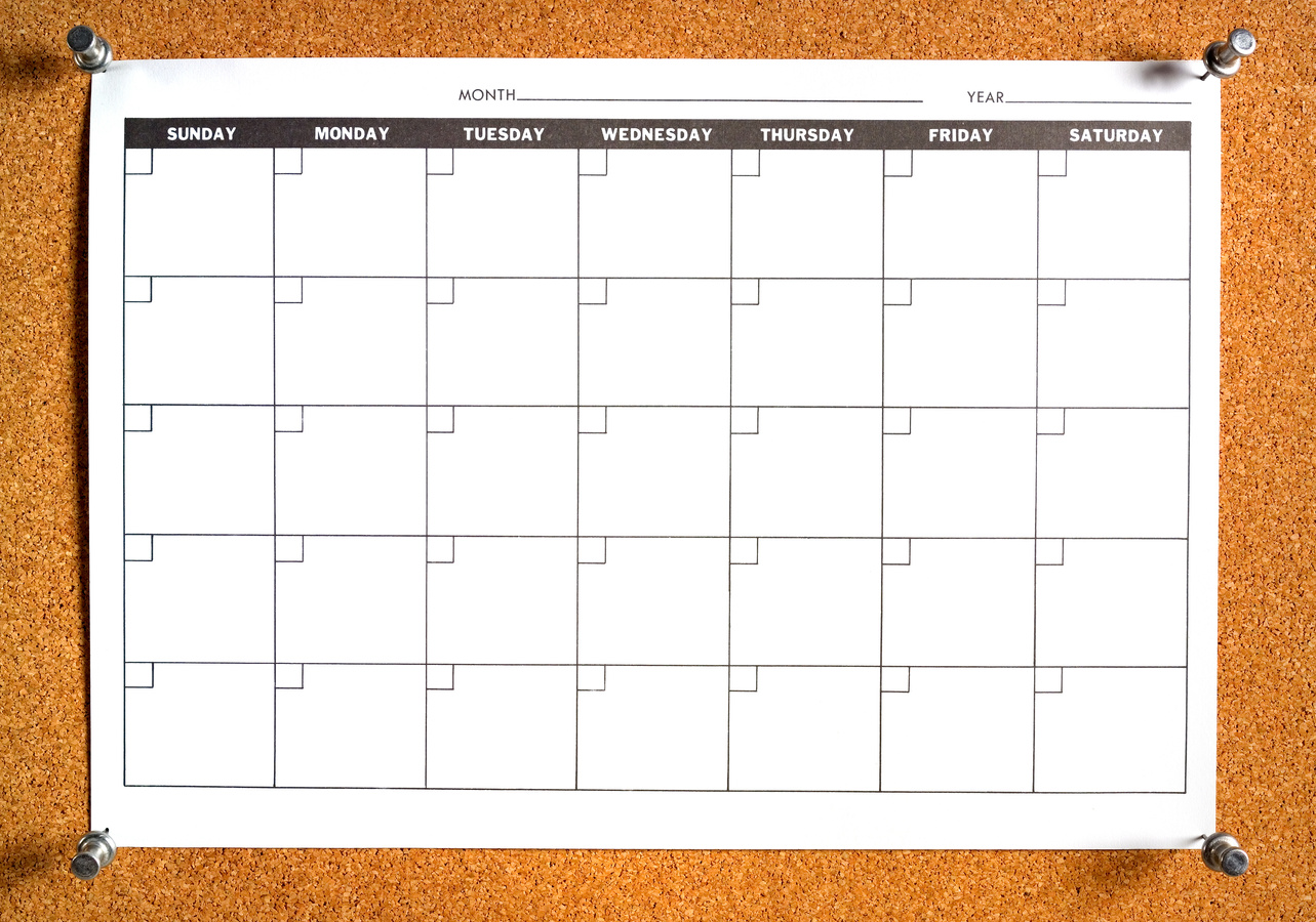 blank calendar on bulletin board